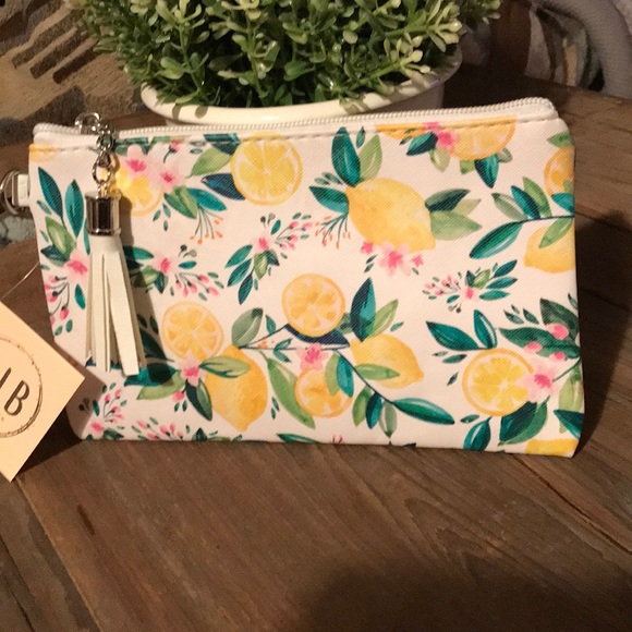 L.I.B New York Handbags - Lemon grove tassel pouch
